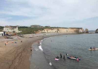 Enjoy the beach and the beautiful cliffs at Freshwater Bay