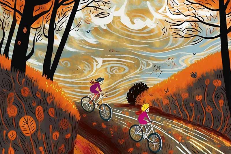 Cyclists on a windy autumn day